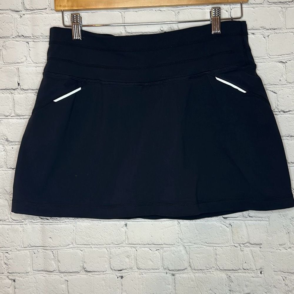 Athleta Womens Black Skorts Skirt Shorts size Medium Mesh Zipper Pocket